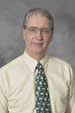Professional headshot of Brian Kent