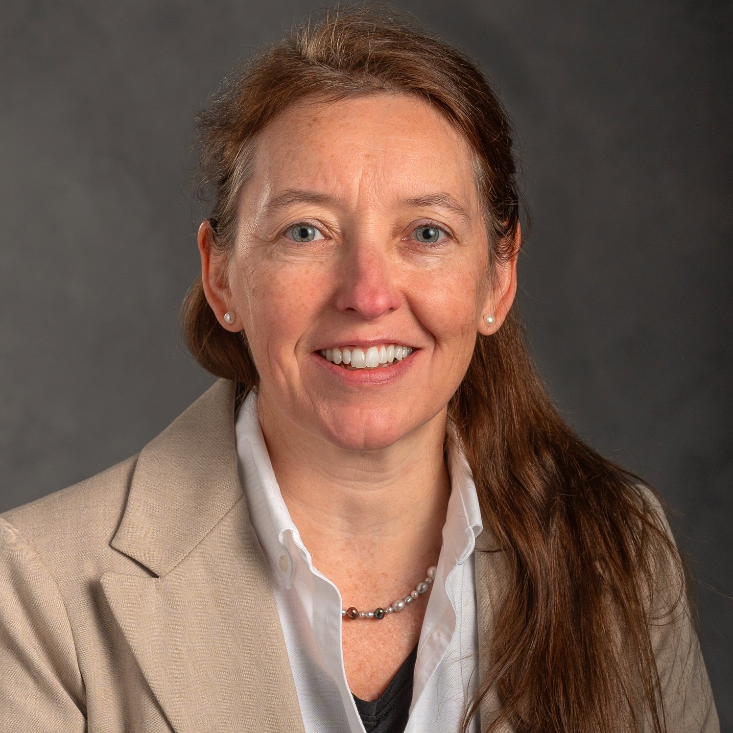 Professional headshot of Alison Cupples