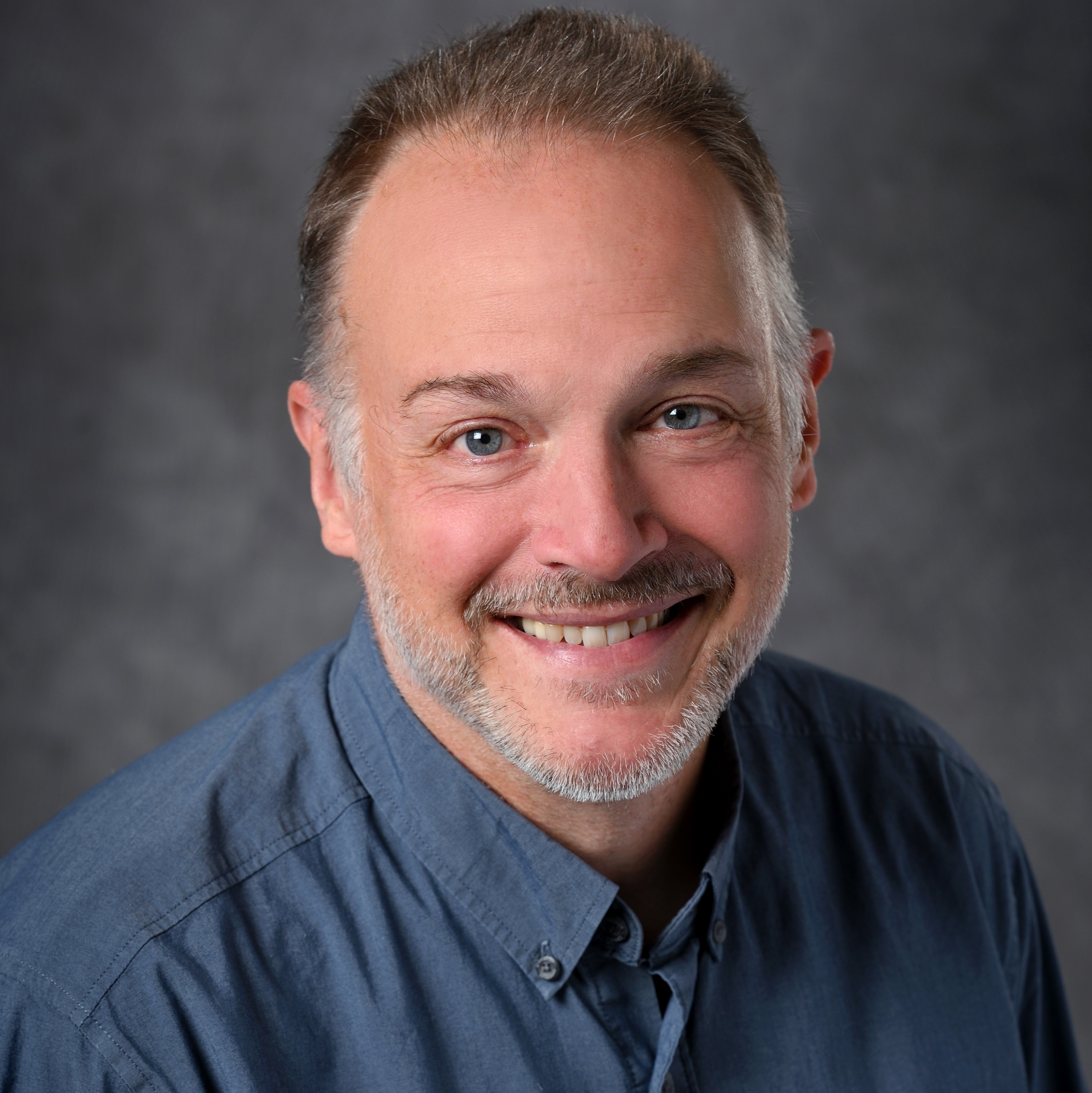 Professional headshot of Scott Calabrese Barton