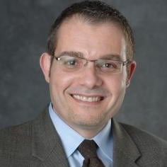 Professional headshot of Karim Chatti