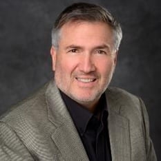 Professional headshot of Christopher Contag