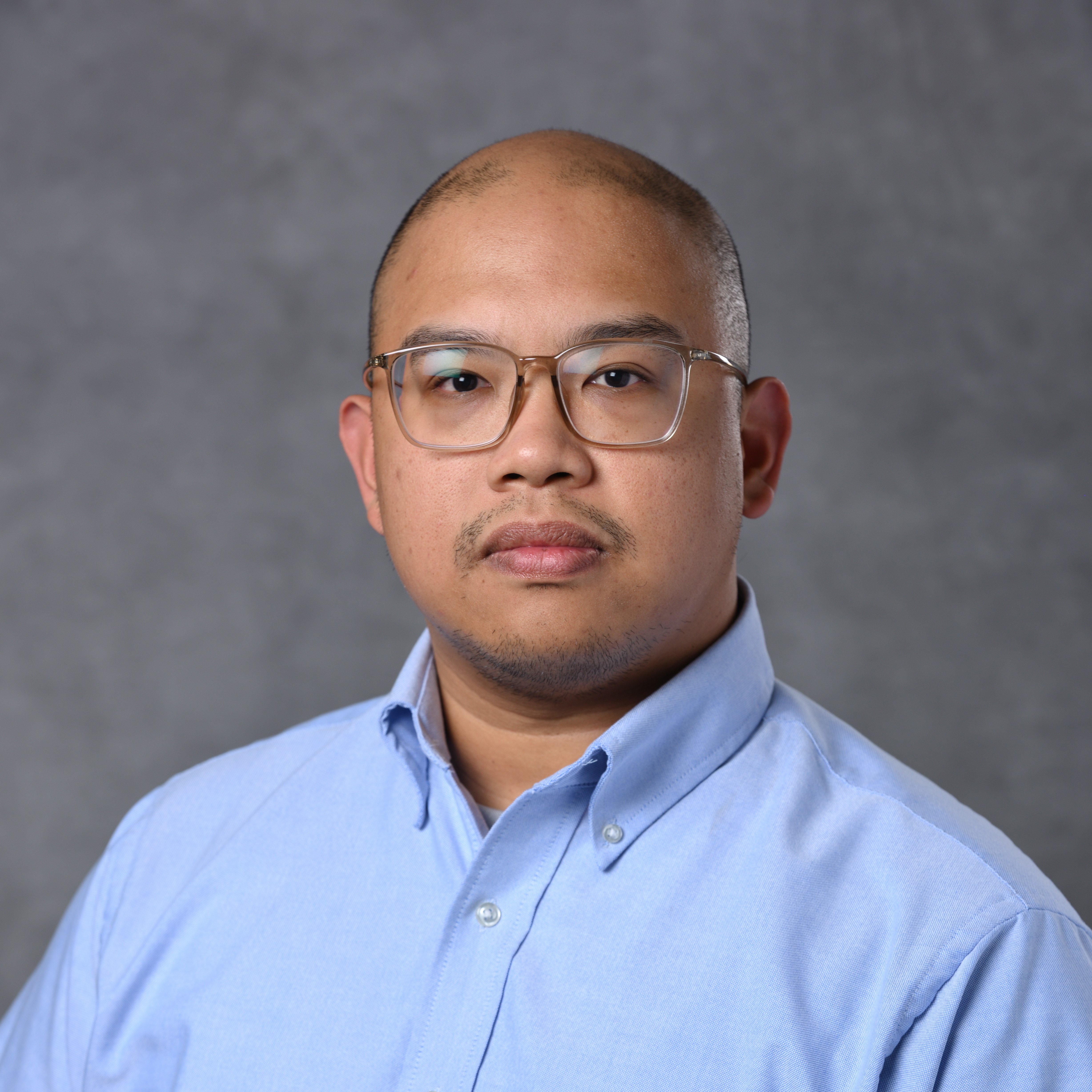 Professional Headshot of Dmitri Cordova