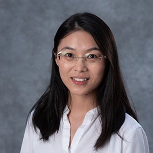 Professional headshot of Bei Fan