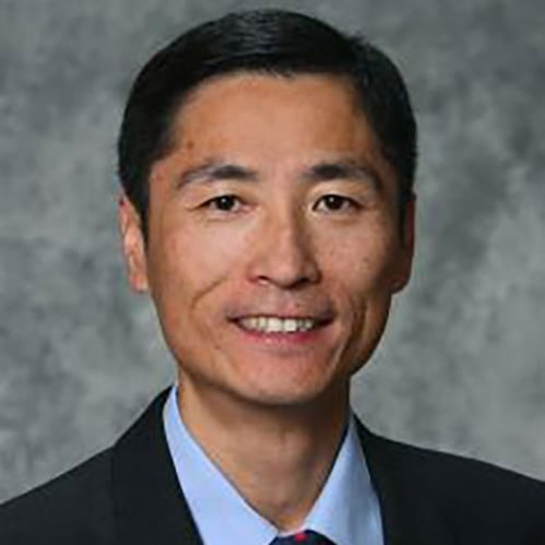 Professional headshot of Qi Fan