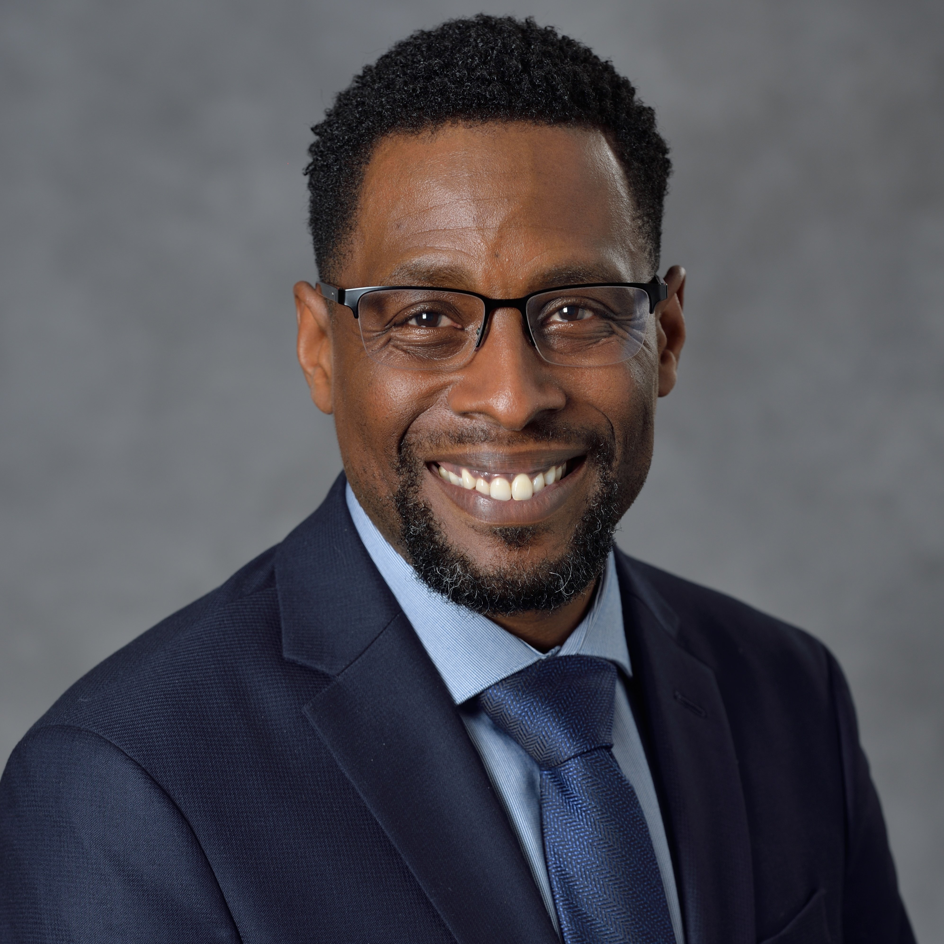 Professional headshot of Kyle Foster