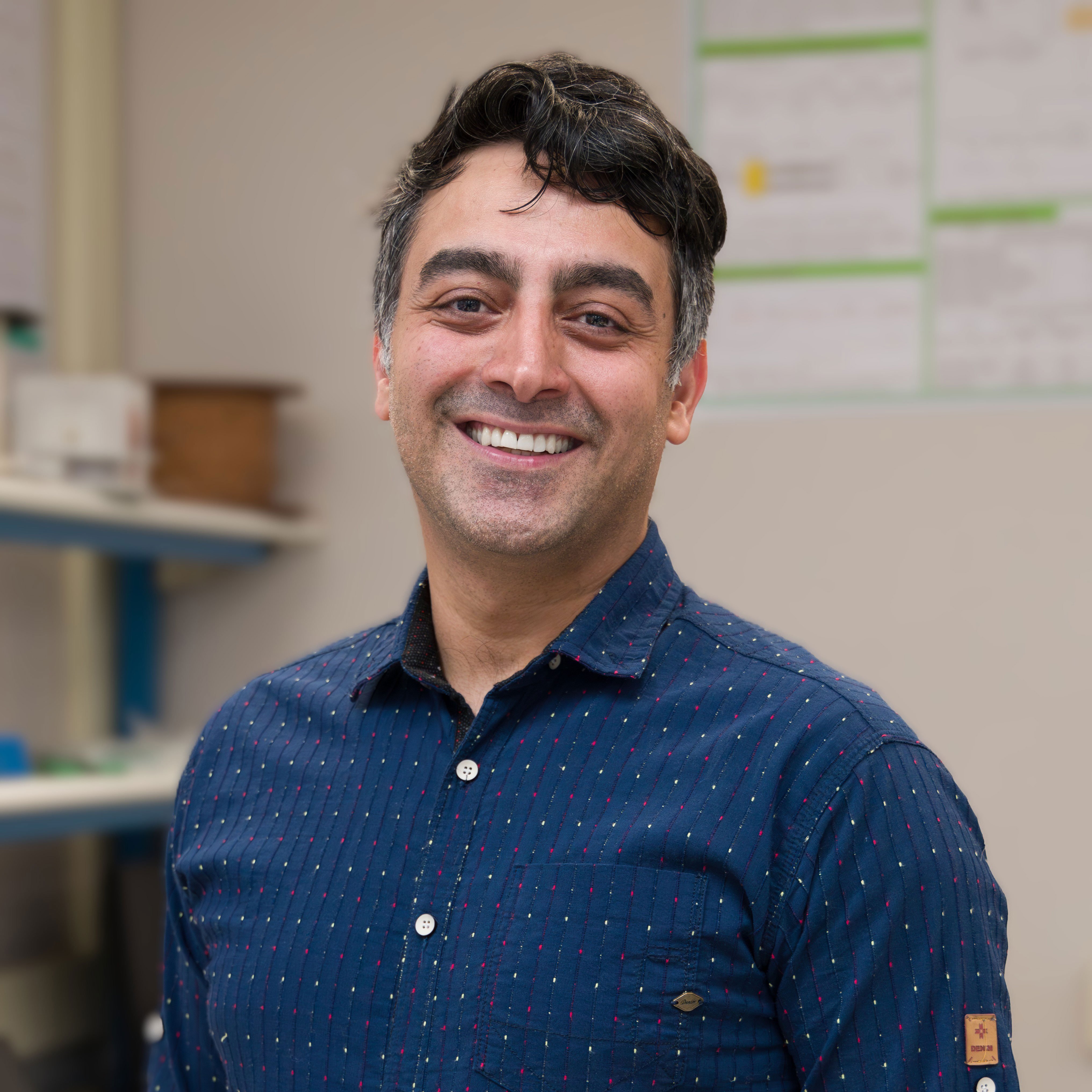 Professional headshot of Omid Beik