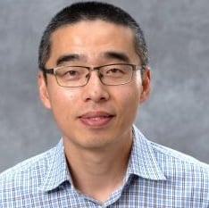 Professional headshot of Yang Guo