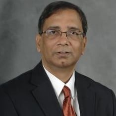 Professional headshot of Syed Hashsham