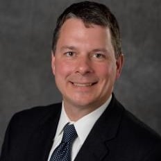 Professional headshot of Andrew Hazel