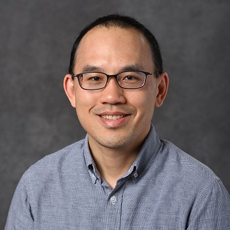 Professional headshot of Kevin Liu