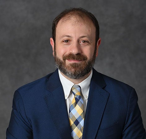 Professional headshot of Michele Lanotte