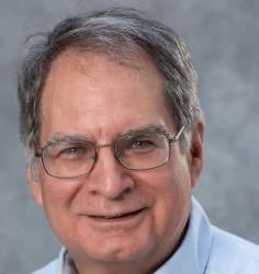 Professional headshot of Carl Lira