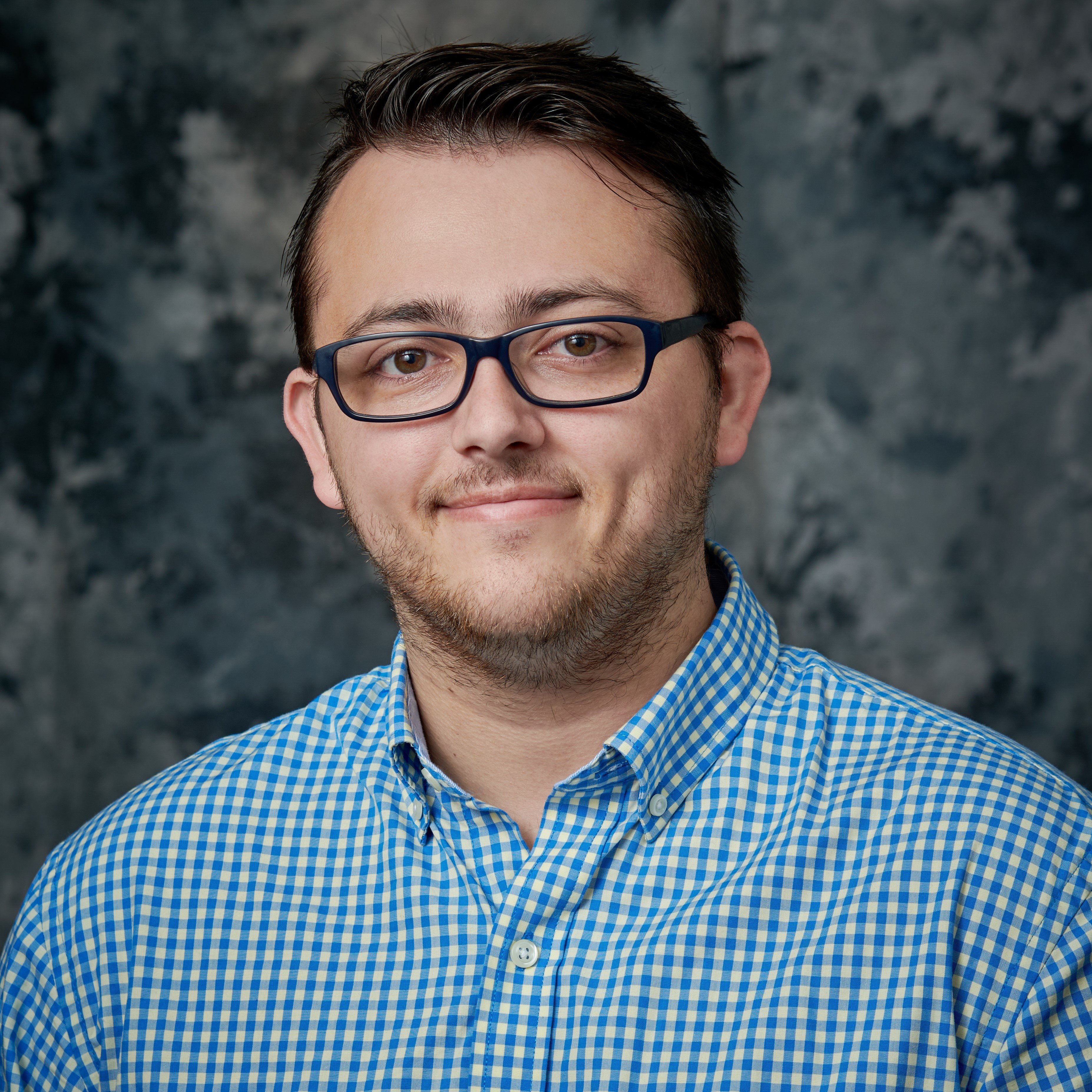 Professional headshot of James Mariani