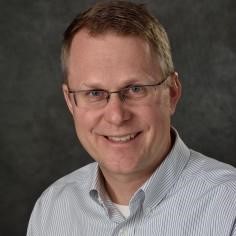 Professional headshot of Robert McGough