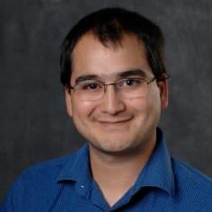 Professional headshot of Joshua Nahum