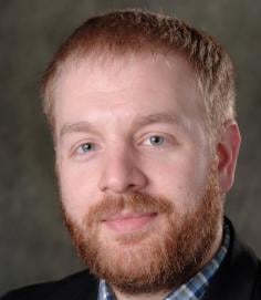 Professional headshot of  David Olson
