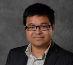 Professional headshot of Zhen Qiu