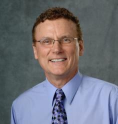 Professional headshot of Arthur Schober