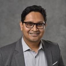 Professional headshot of Debajit Saha