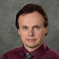 Professional headshot of Thomas Schuelke