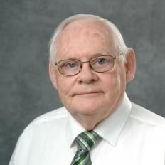 Professional headshot of Truman Surbrook