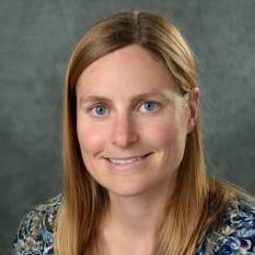 Professional headshot of Elisa Toulson