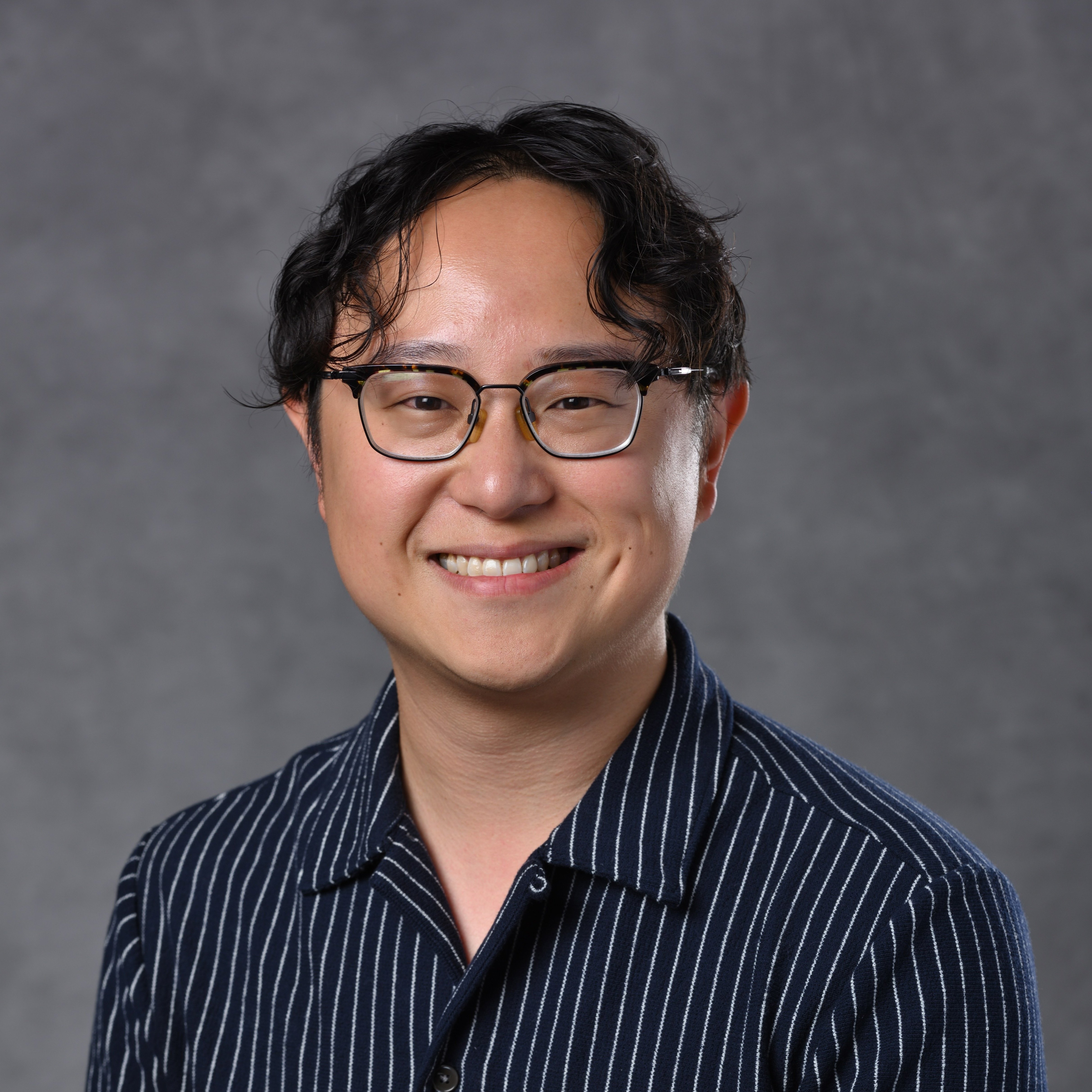 Professional headshot of  Jeffrey Tsang