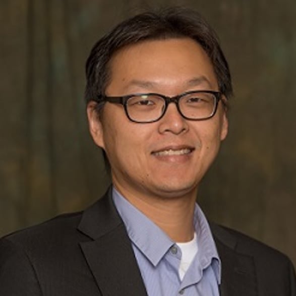 Professional headshot of Guan-Hua Tu