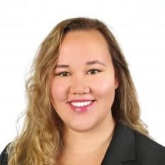 Professional headshot of Bige Unluturk