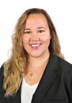 Professional headshot of Bige Unluturk