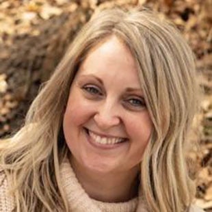 Professional headshot of  Courtney Biddinger