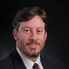 Professional headshot of John Verboncoeur