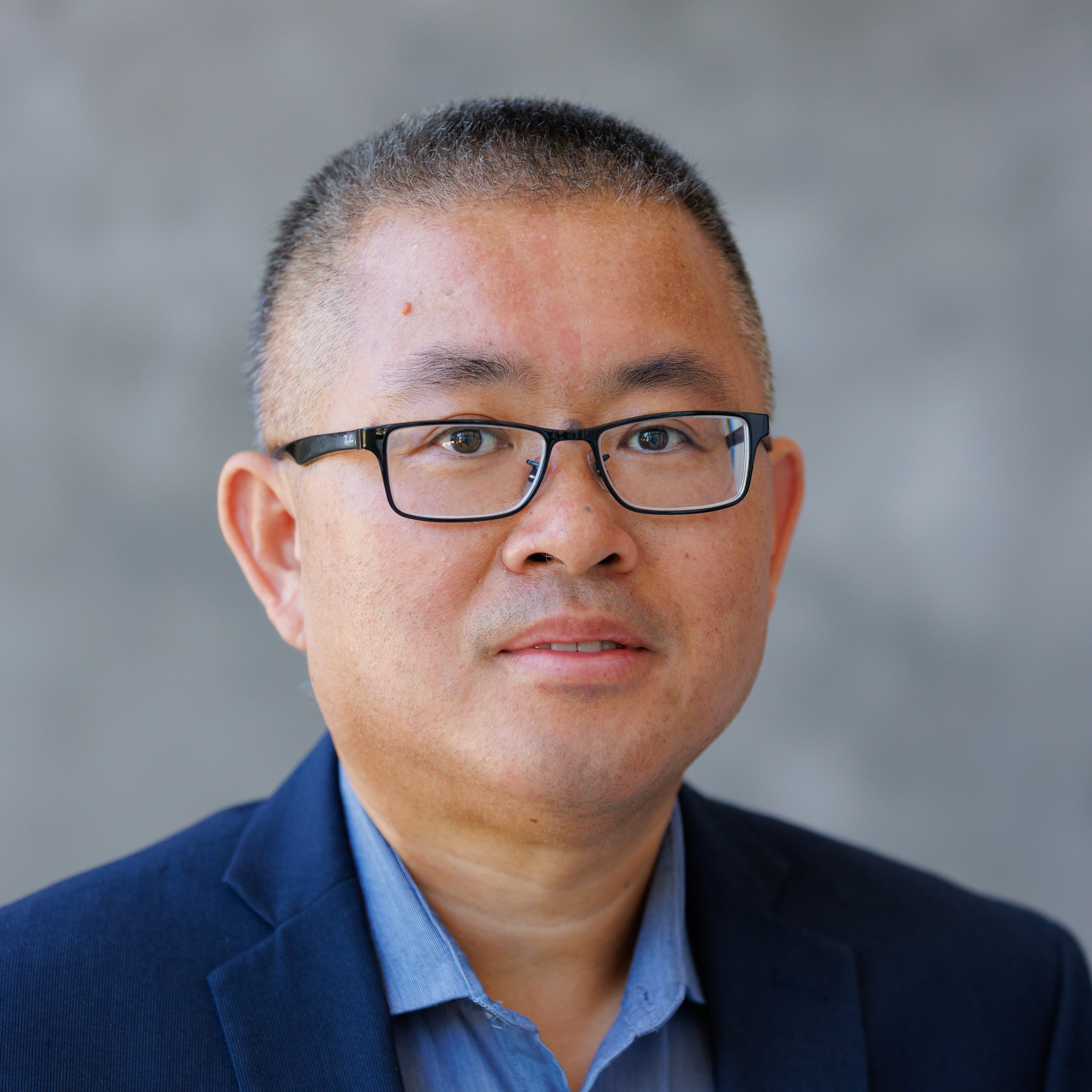 Professional headshot of Ruigang Wang
