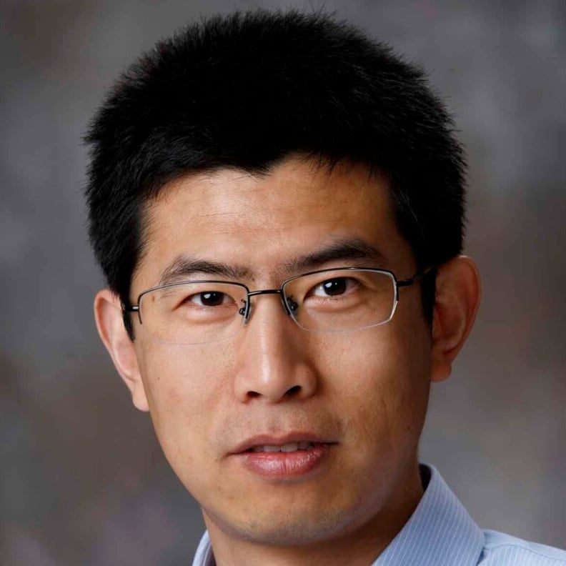 Professional headshot of Ruiguo Yang