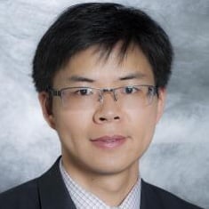 Professional headshot of Huacheng Zeng