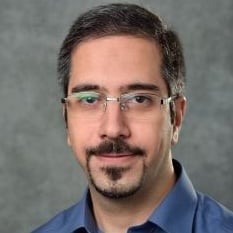 Professional headshot of Ali Zockaie