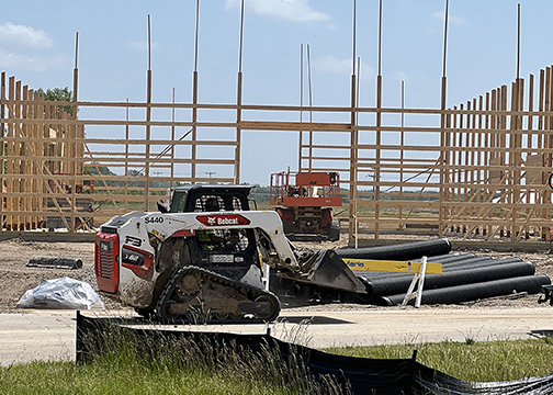 The building form was emerging by mid-June.