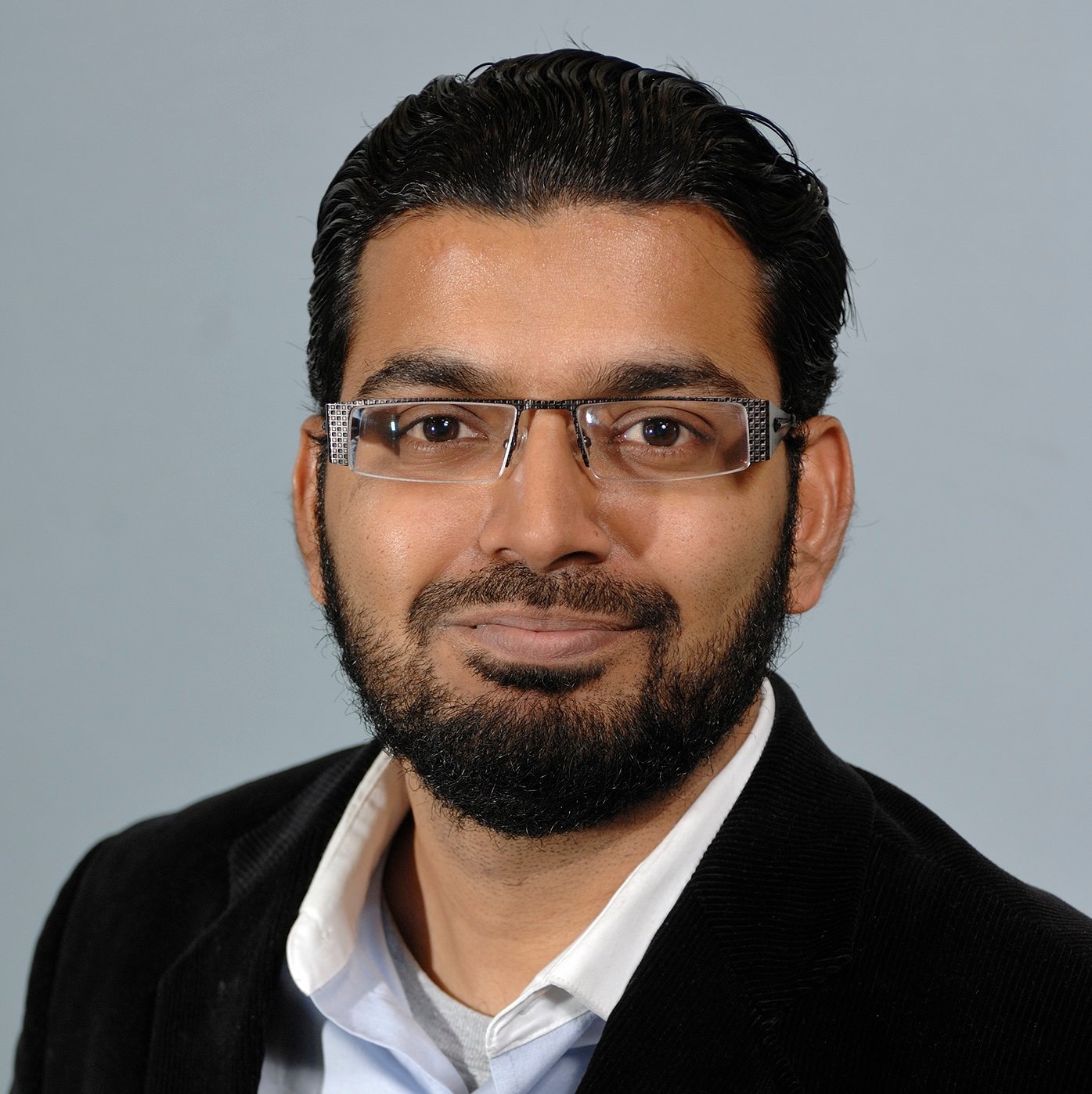 Professional headshot of Mahmoodul Haq