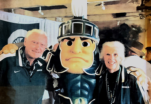 Photo of the Prescotts at the Rose Bowl with Sparty