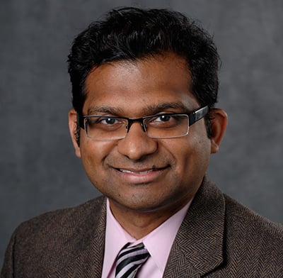 Professional headshot of Arun Ross