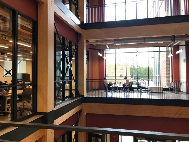 The 150,000-square-foot STEM building has tall glass windows that open the space to panoramic outdoor views.