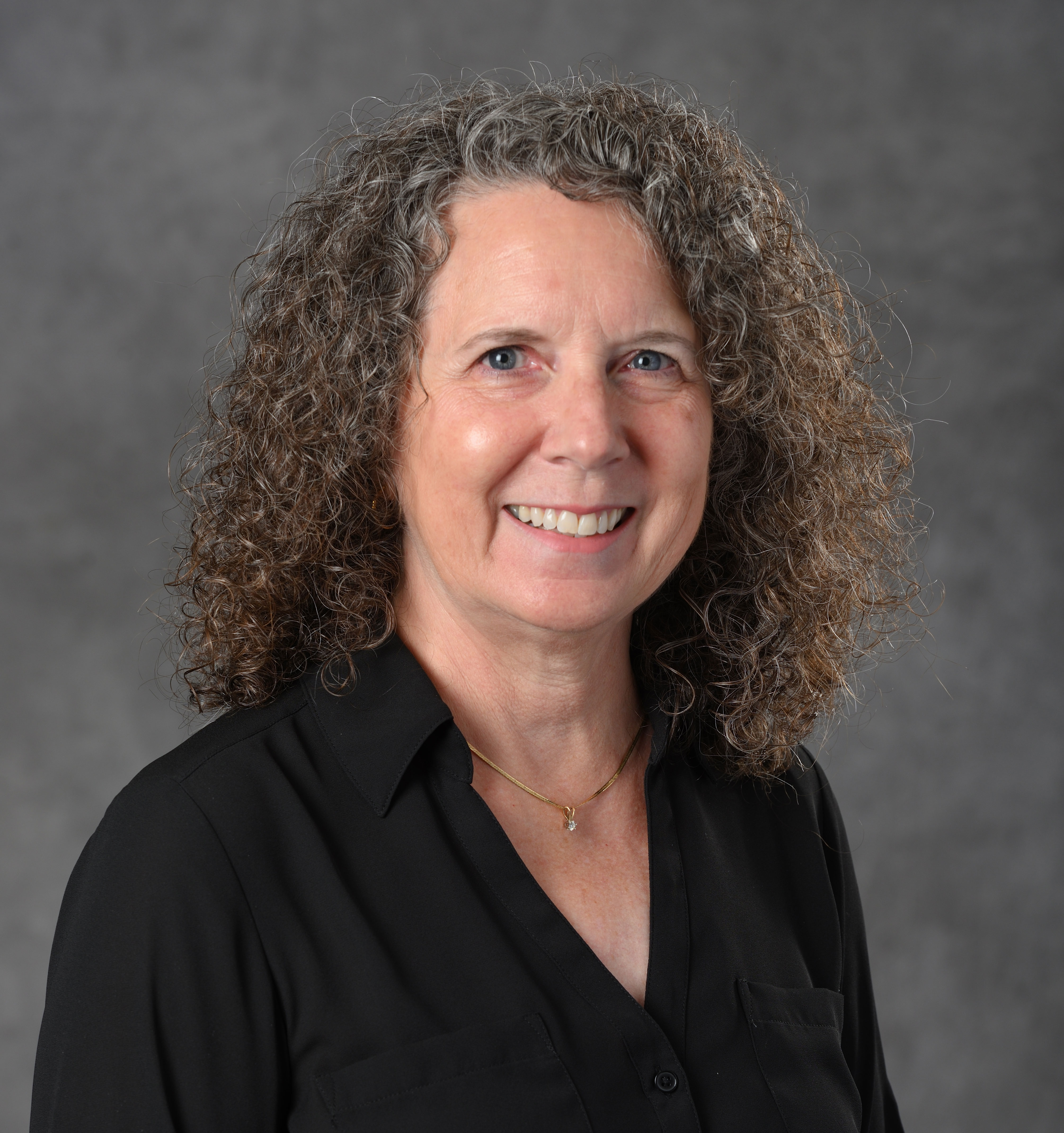 Professional headshot of Janet Brelin-Fornari