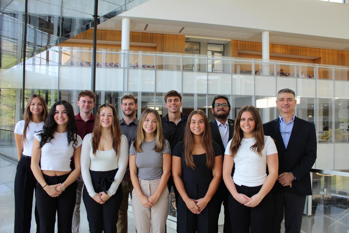 Erkan Kocas (right) and the fall 2024 Michigan Export Growth Program team. Courtesy photo