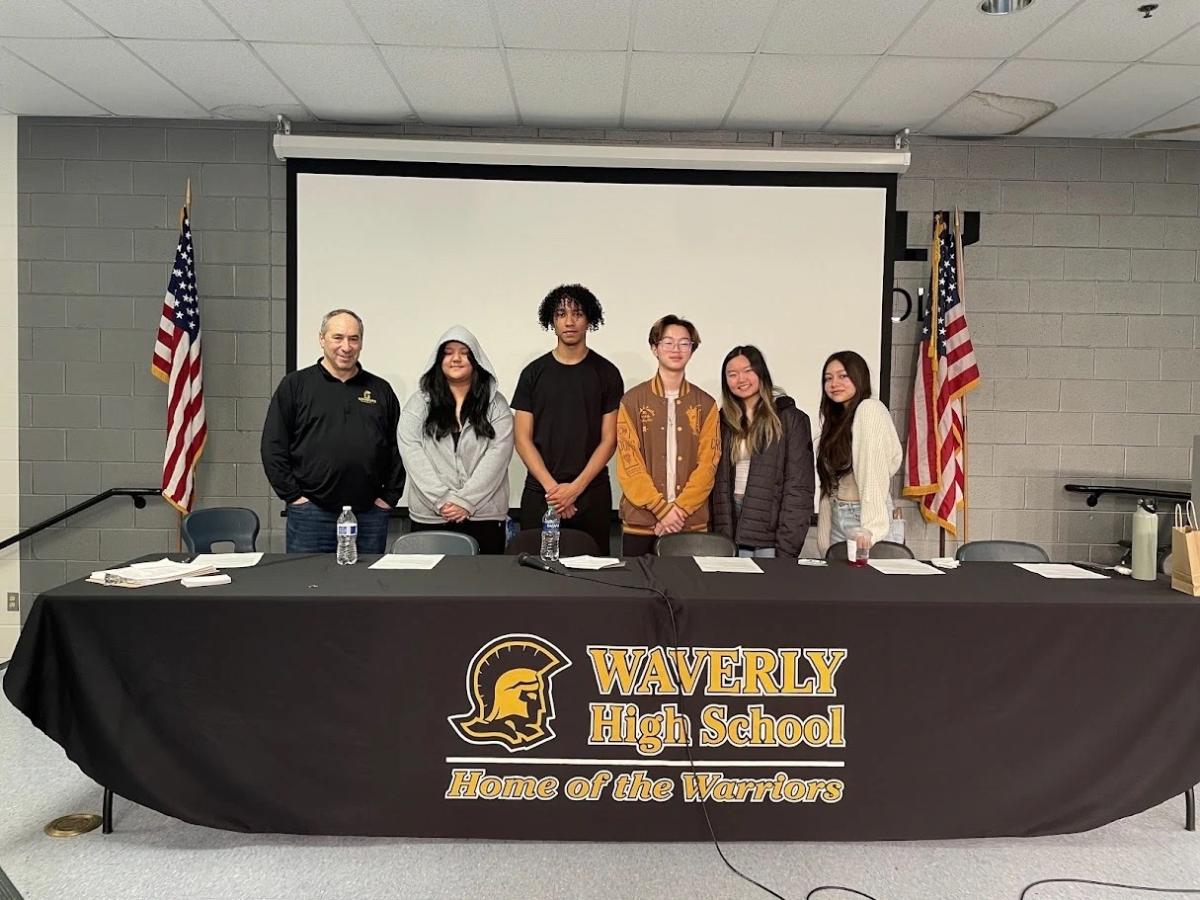 Robert Lurie (left), and a group of students from Waverly High School. Courtesy photo