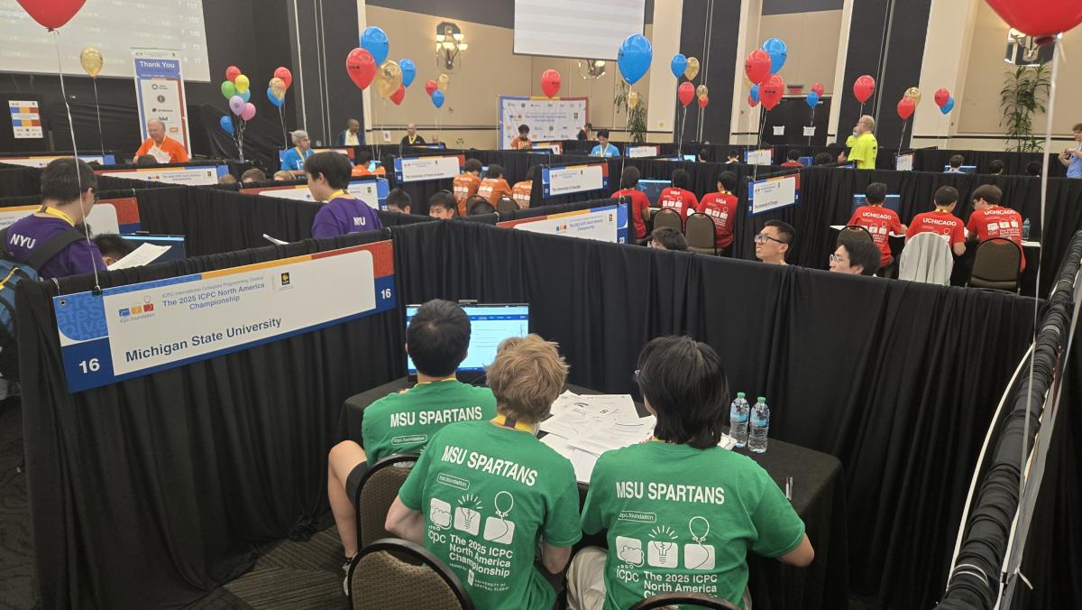 MSU competitive programming team at their table during the ICPC North America Championship