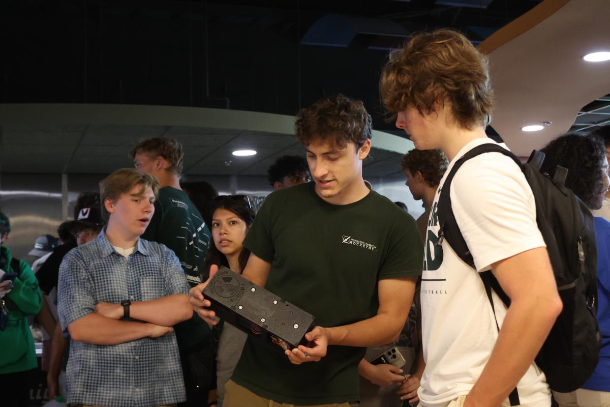 Students interacting at 2025 Colloquium