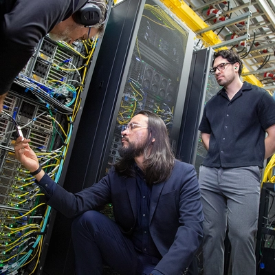 Mendoza-Cortes and Daniel Maldonado Lopez checking wires