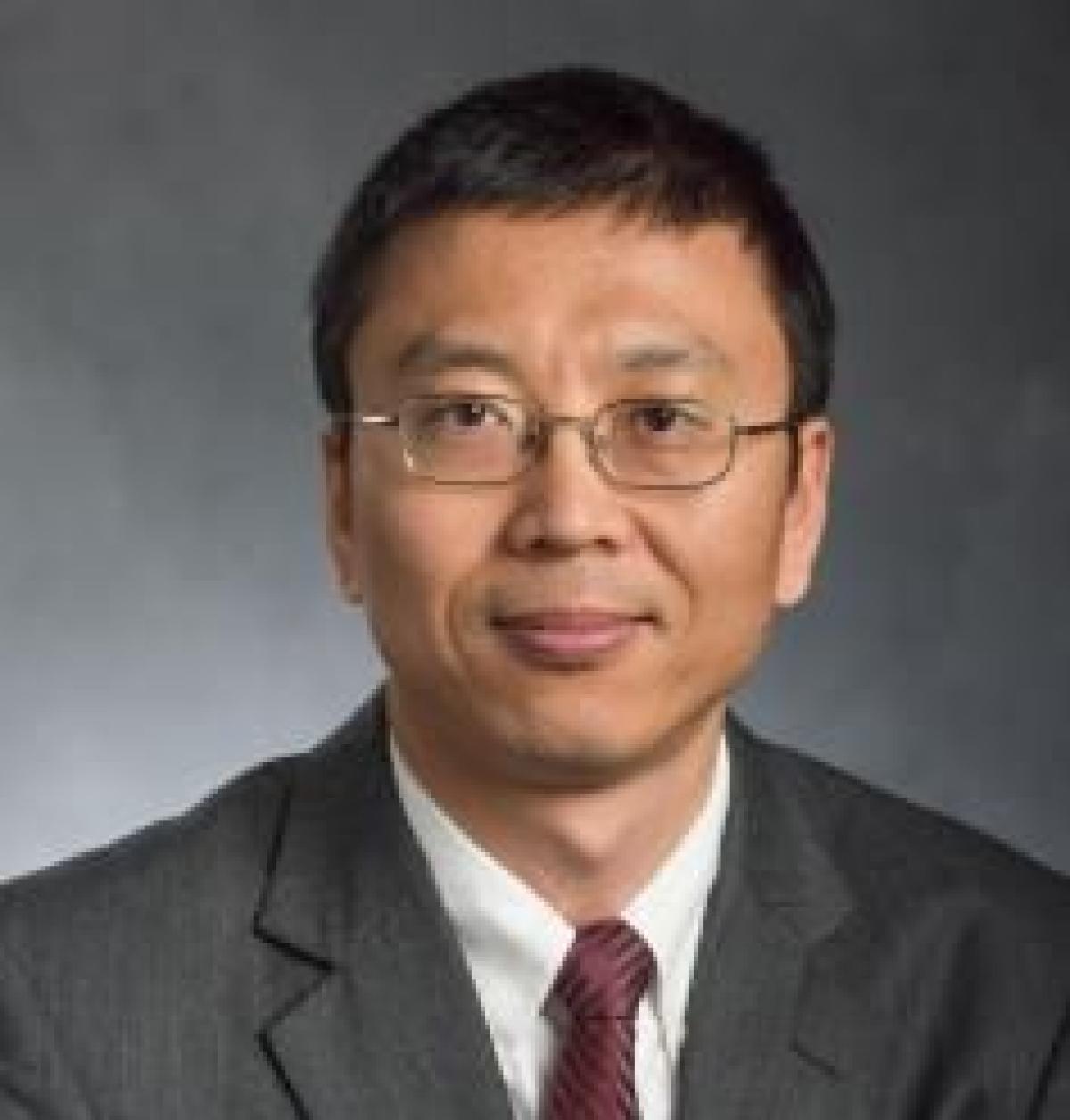 Professional headshot of Ming Han