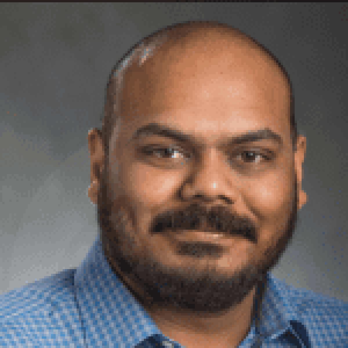 Professional headshot of Sunil Chakrapani