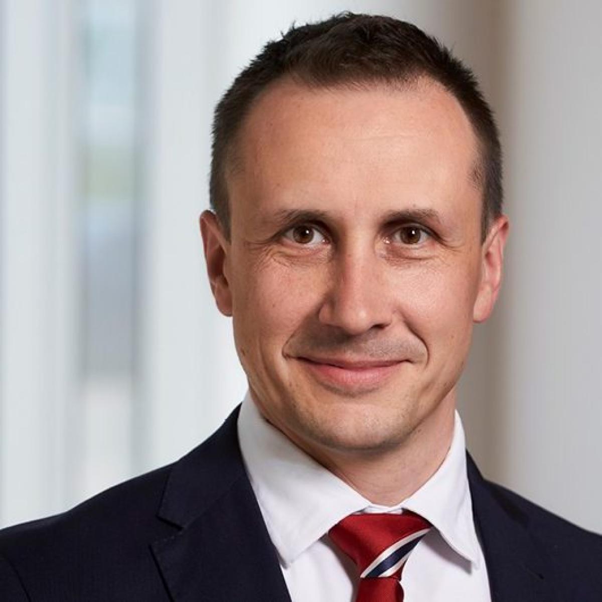 Professional headshot of Valerii Kucherenko